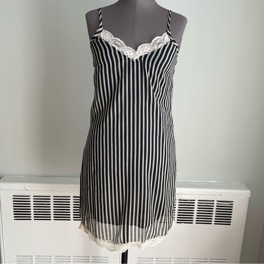 Velocity striped slip dress with lace trim.